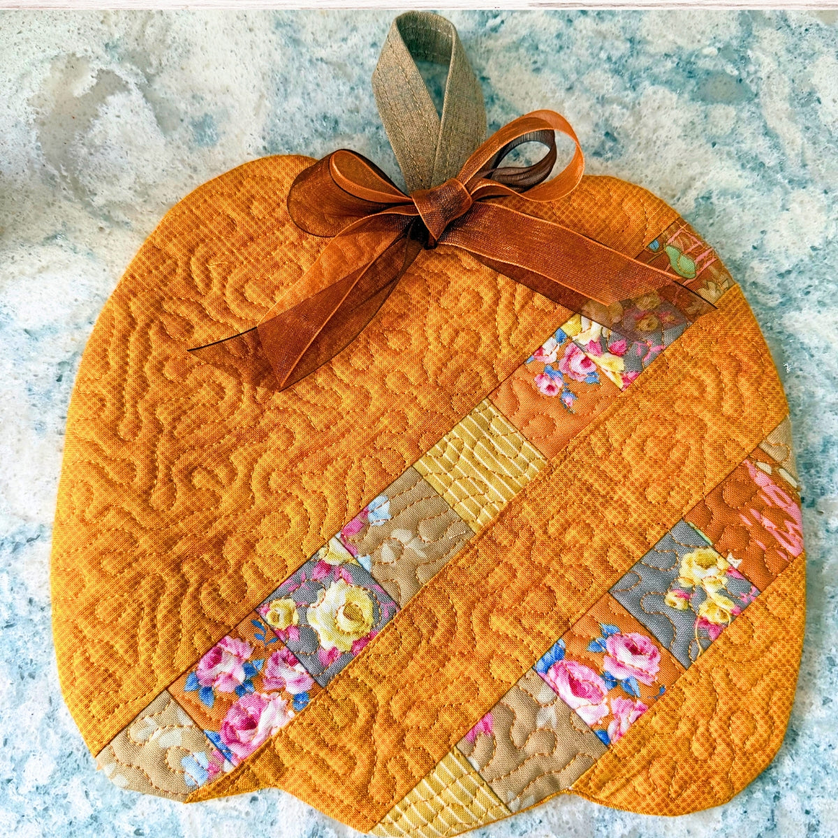 Patchwork pumpkin trivet in the hoop machine embroidery design
