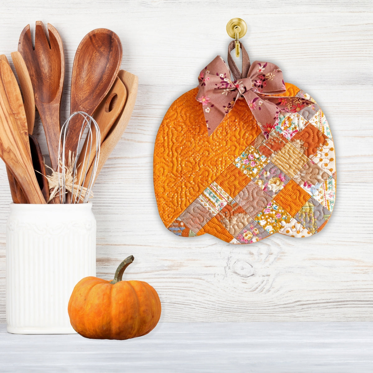 Patchwork pumpkin quilted trivet in the hoop machine embroidery design