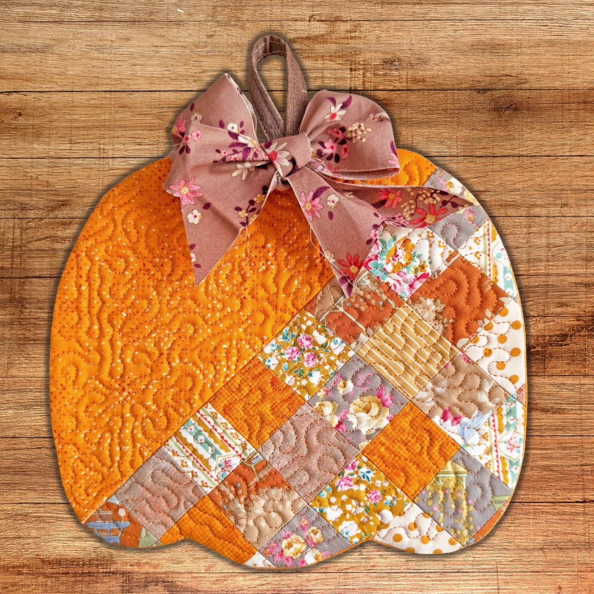 Patchwork pumpkin quilted trivet in the hoop machine embroidery design